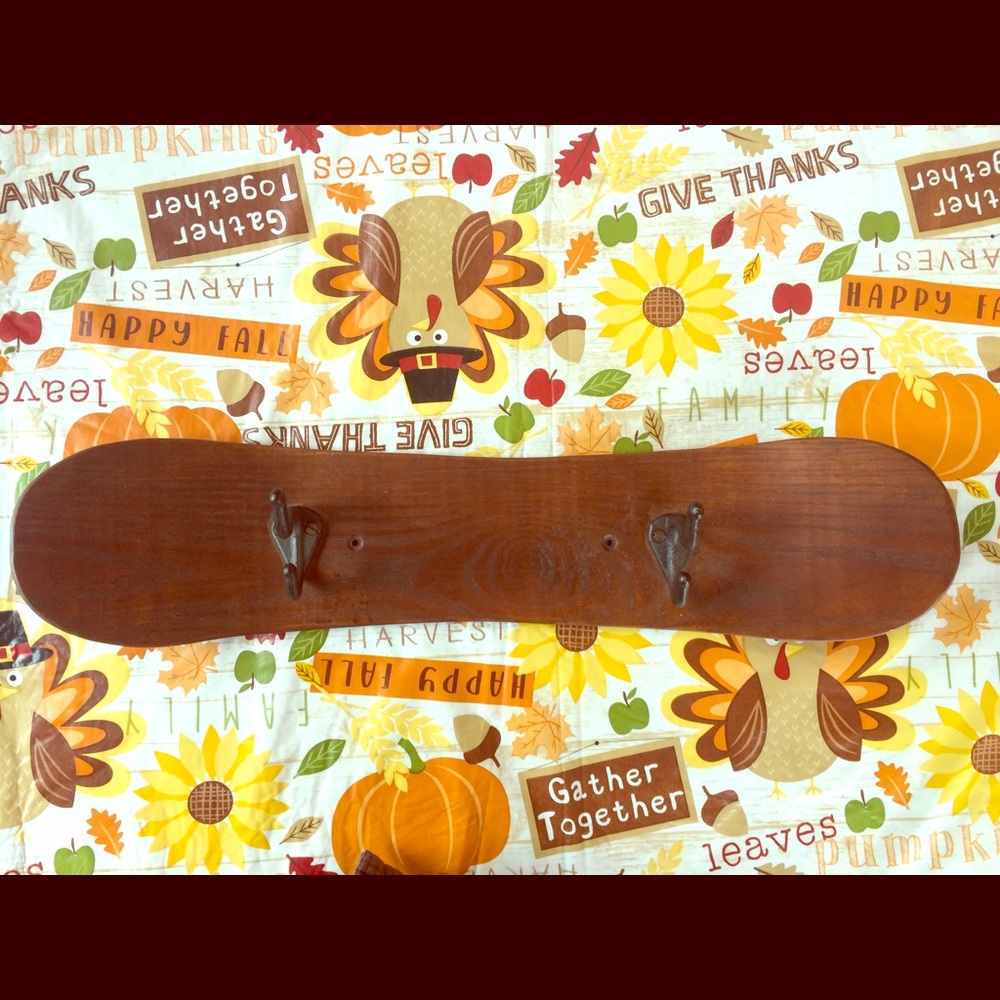 Wooden snowboard coat rack